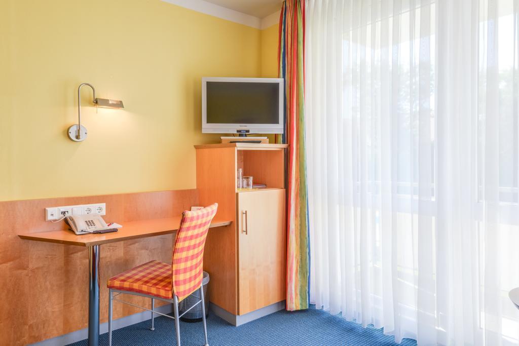 Hotel Beim Schrey Kirchheim bei Muenchen Oda fotoğraf